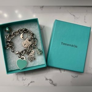 Tiffany & Co. charm bracelet with the pictured charms